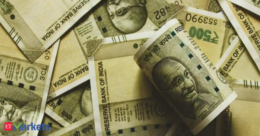 Competing cues, caution ahead of RBI policy decision keep rupee nearly flat
