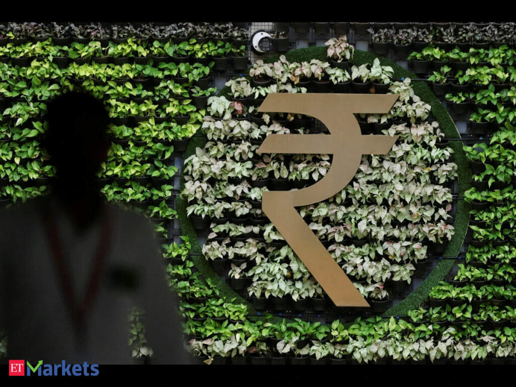 Rupee edges higher as traders await RBI policy decision on rates